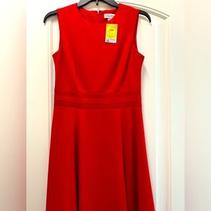 New Ladies sleeveless red dress with tags. Size 4 small. Calvin Klein brand